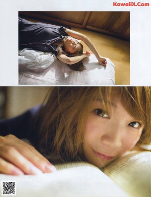A young woman eating a piece of bread.